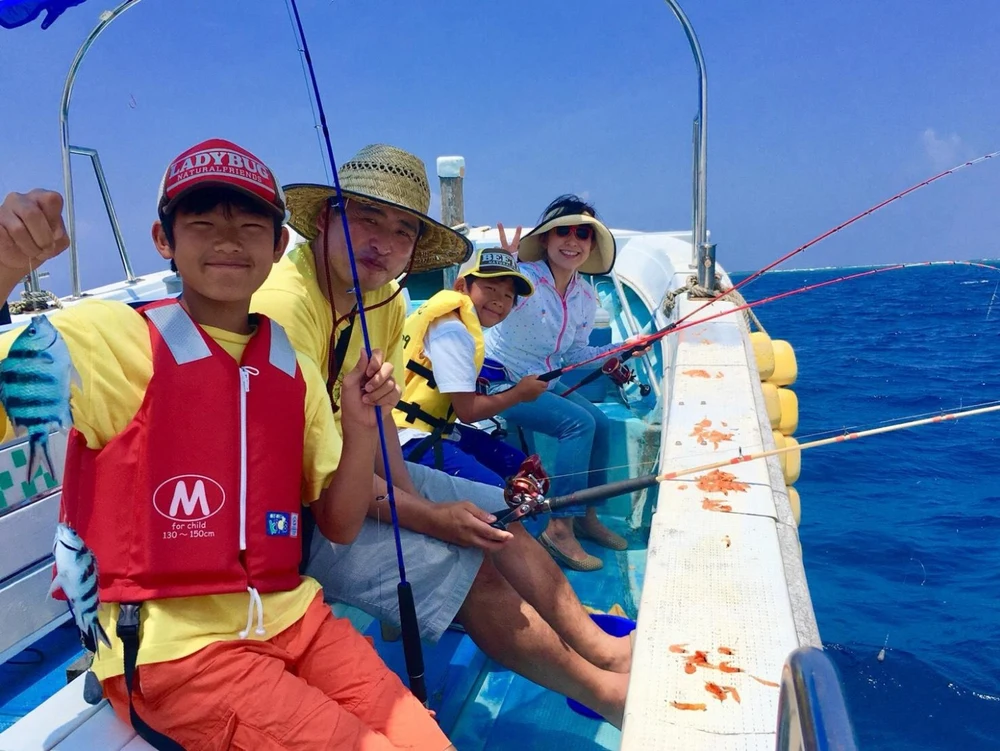 family fishing in Okinawa sea